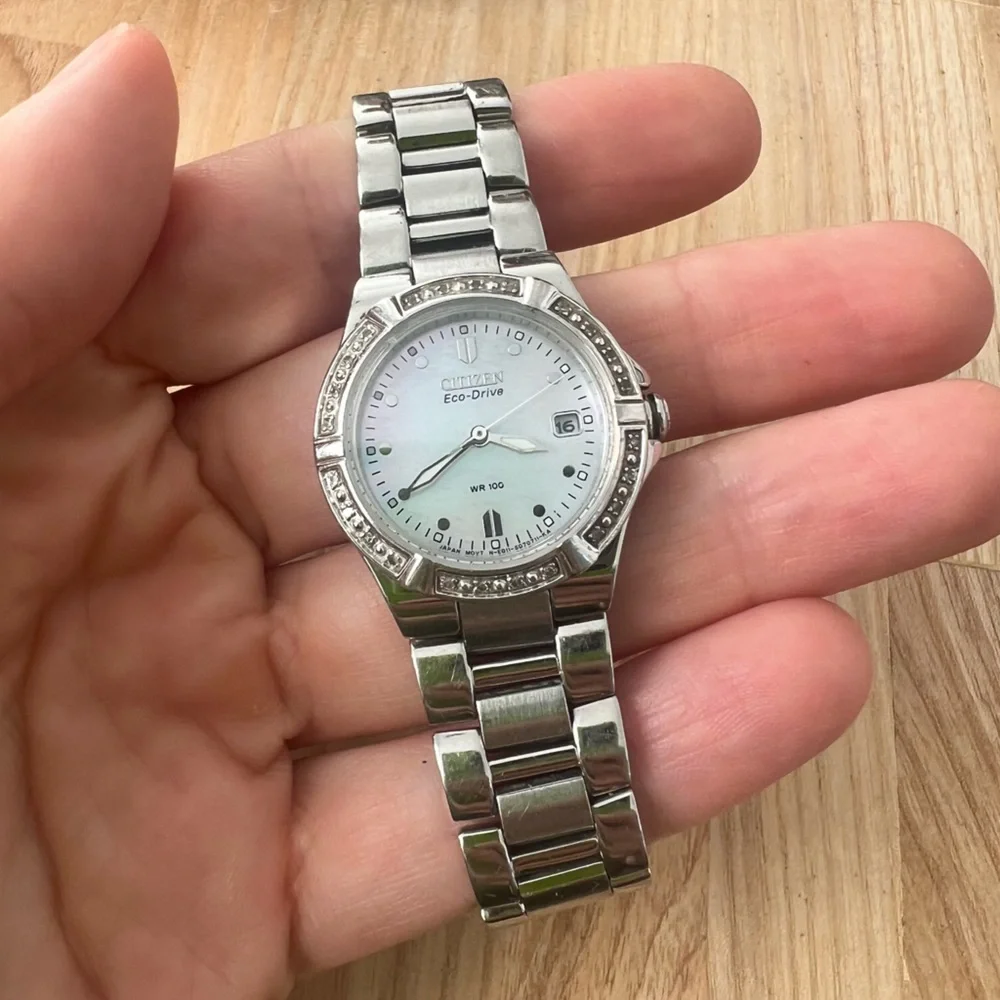Citizen eco-drive ladies silver tone diamond solar dress watch